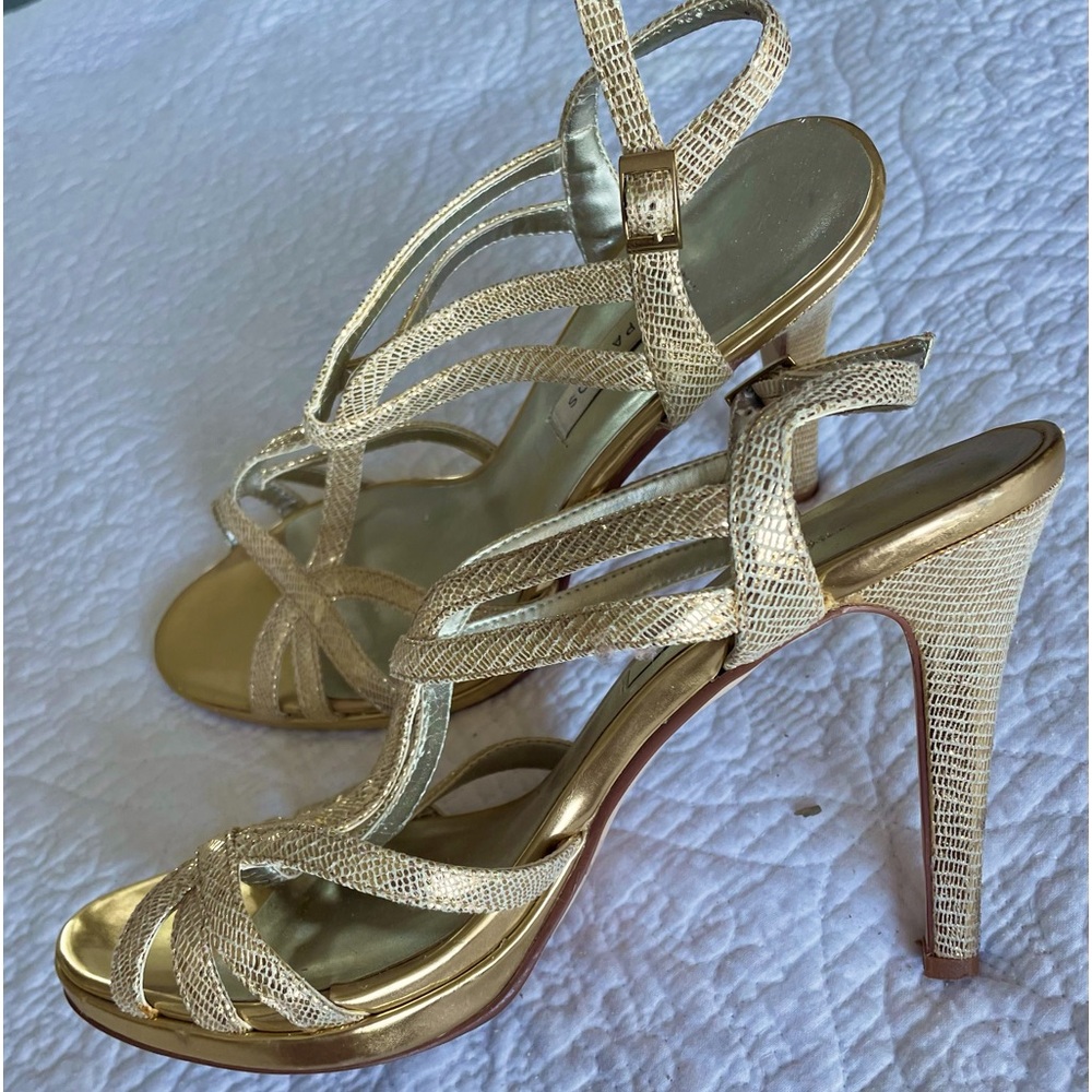 Gold Caparros heels mint condition